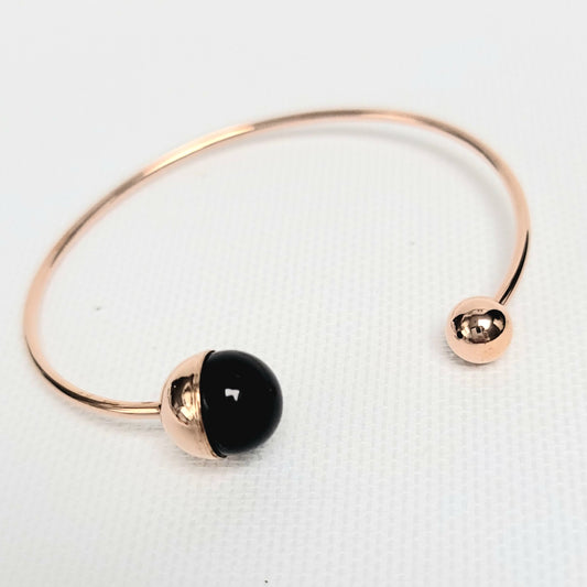 Open bangle black bead bracelet